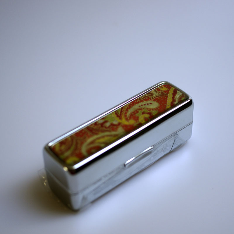 "Červené paisley" (krabička na rtěnku)